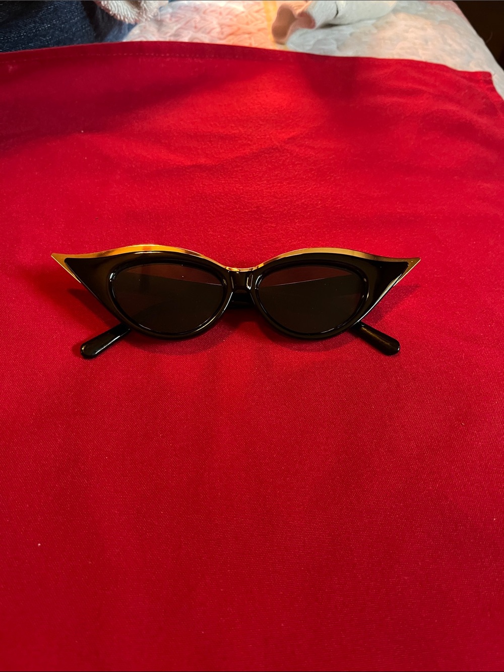 Women’s Black Cat-Eye Sunglasses with Gold Accent